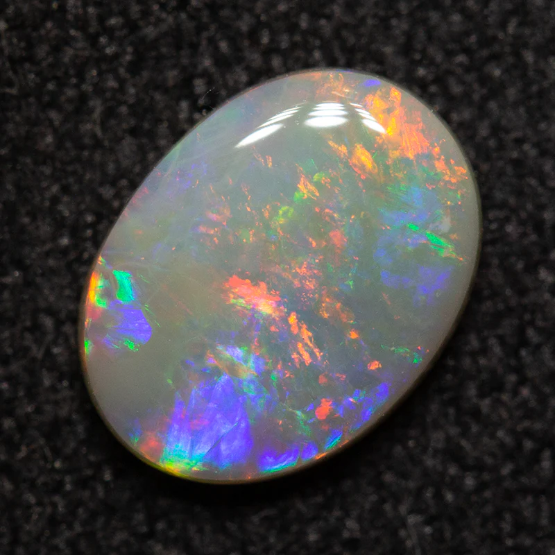 0.73 ct dark opal 7.8x5.8x2.3mm - Image 2