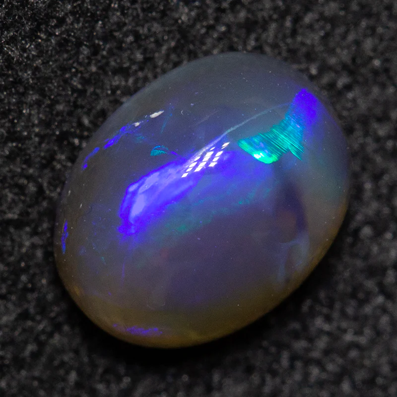 0.74 ct black opal 6.6x5.1x3.5mm - Image 2