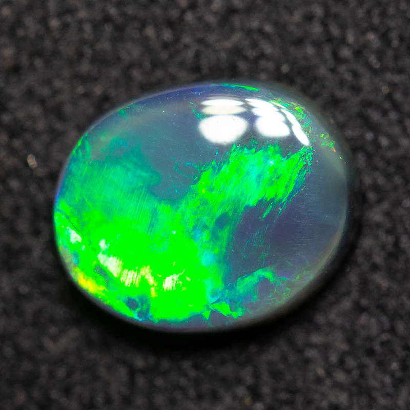 0.74 ct black opal 7x5.9x2.5mm - Image 3