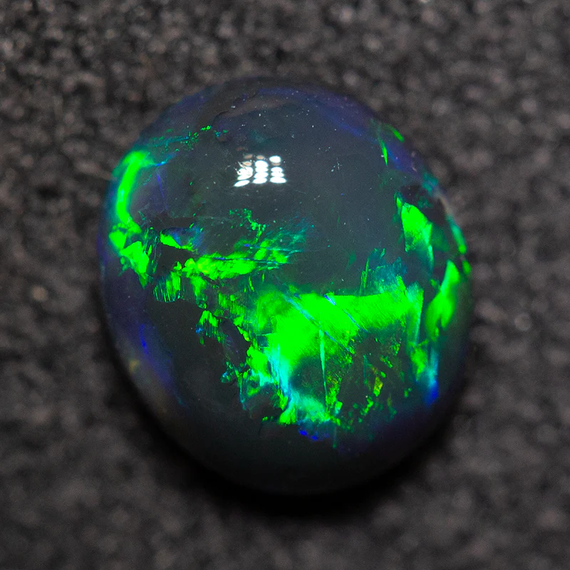 0.74 ct black opal 7x6x3mm - Image 3