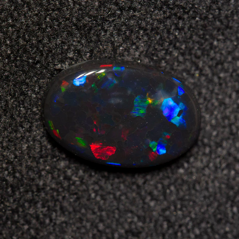 0.74 ct black opal 8.8x5.8x2.1mm - Image 2