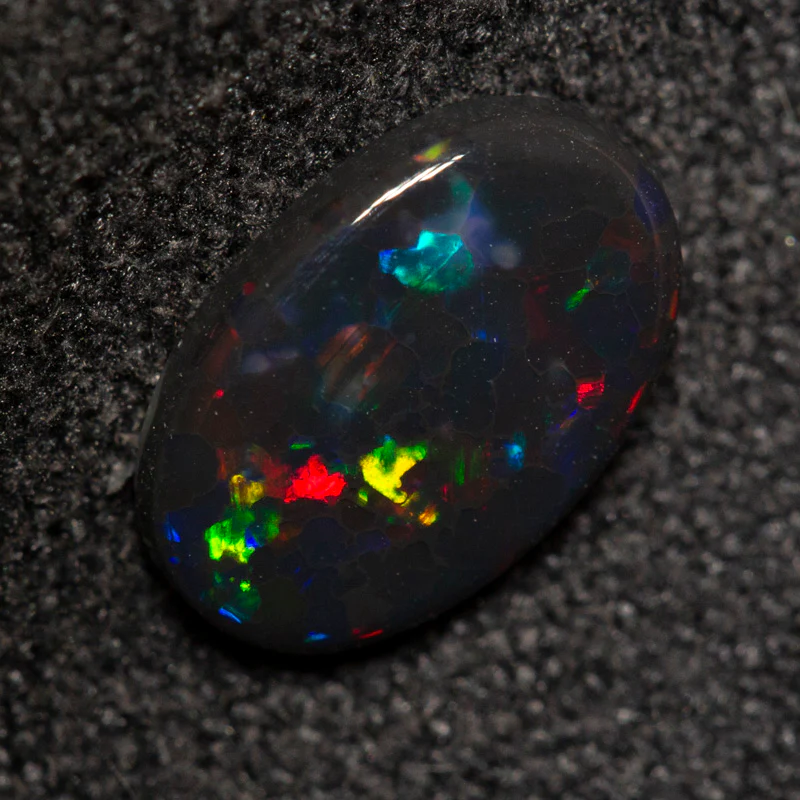 0.74 ct black opal 8.8x5.8x2.1mm - Image 3