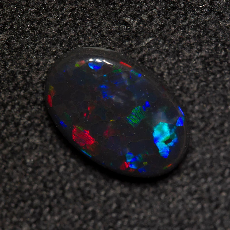 0.74 ct black opal 8.8x5.8x2.1mm - Image 4