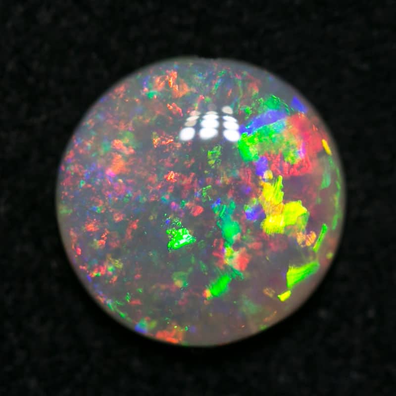 0.74 ct crystal opal 7mm round x 2mm - Image 3