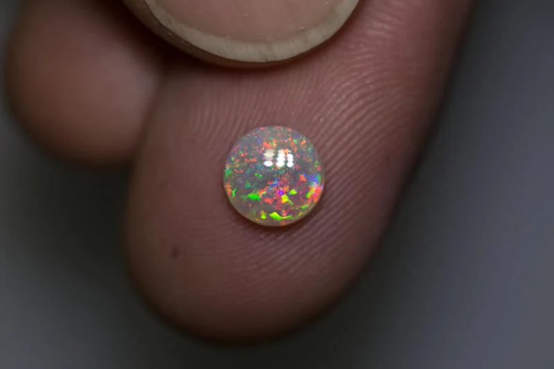 0.74 ct crystal opal 7mm round x 2mm - Image 4