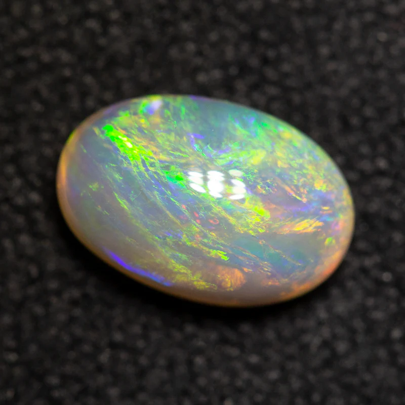 0.74 ct double-sided crystal opal 7.5x5x3.2mm - Image 3