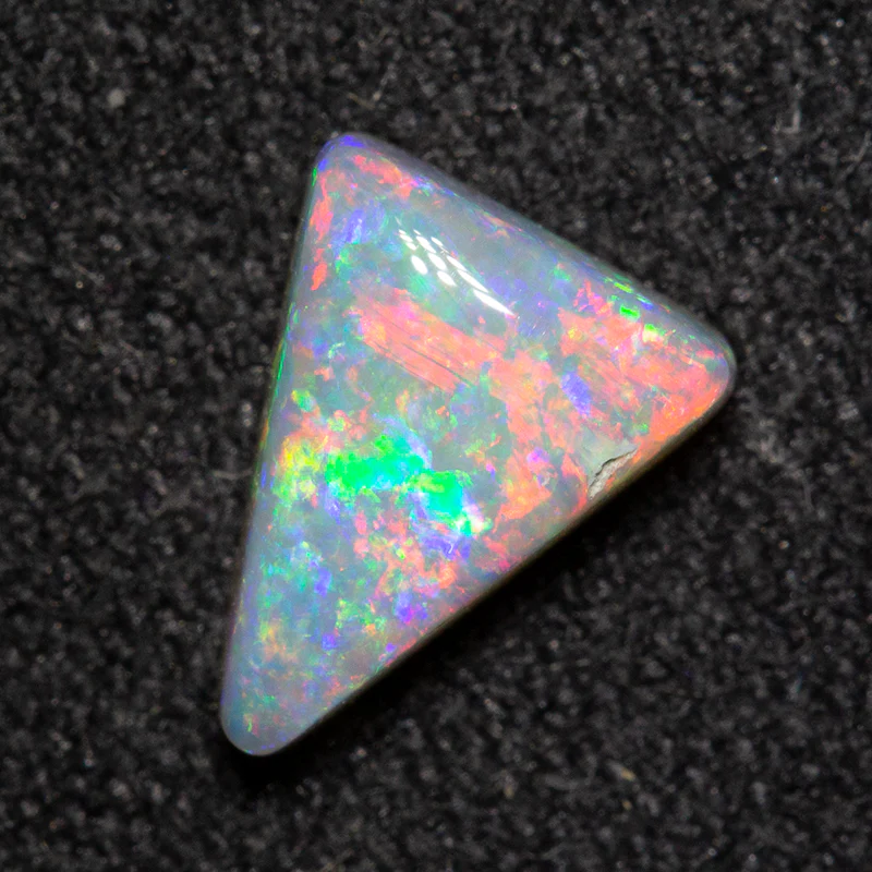 0.74 ct white opal 7.6x6.4x3mm - Image 2