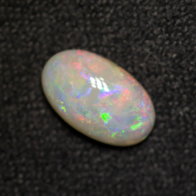 0.74 ct white opal 8.1x5x2.8mm - Image 2