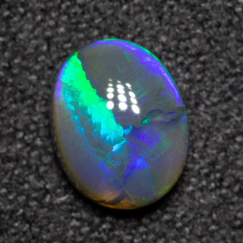 0.75 ct black opal 6.8x5.5x3.3mm - Image 2