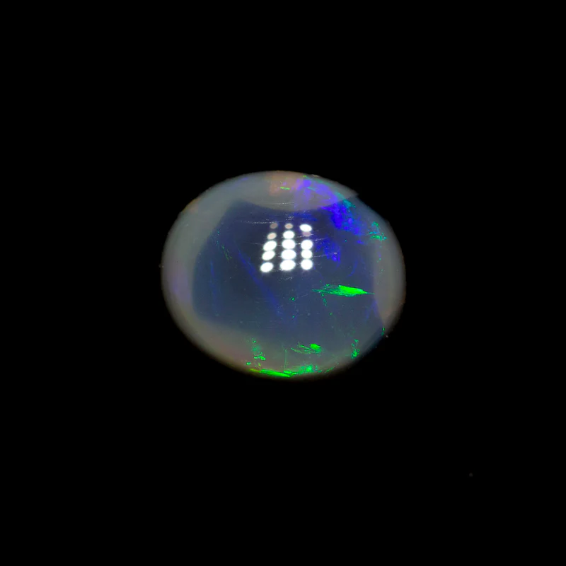 0.75 ct black opal 6.9x5.8x3.1mm - Image 2
