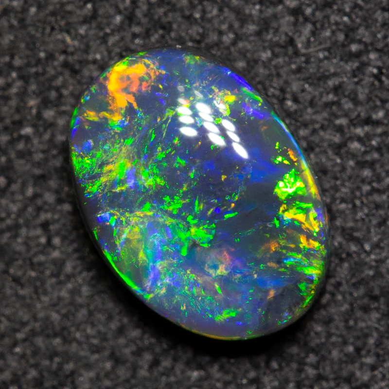 0.75 ct black opal 7.6x5.5x2.7mm - Image 3