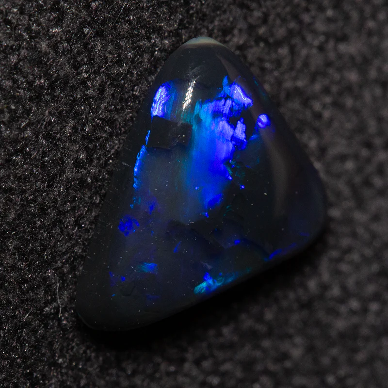 0.75 ct black opal 7.6x7.3x2.6mm - Image 3