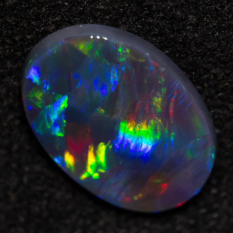 0.75 ct black opal 9.3x6.7x1.8mm - Image 2
