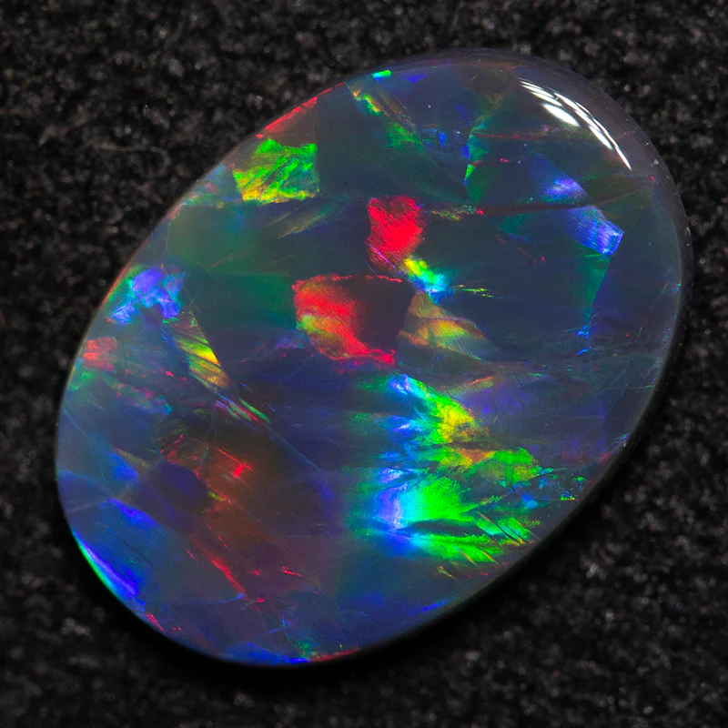 0.75 ct black opal 9.3x6.7x1.8mm - Image 4