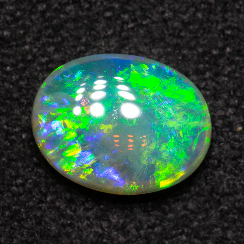 0.75 ct double-sided crystal opal 7.2x5.6x2.8mm - Image 2