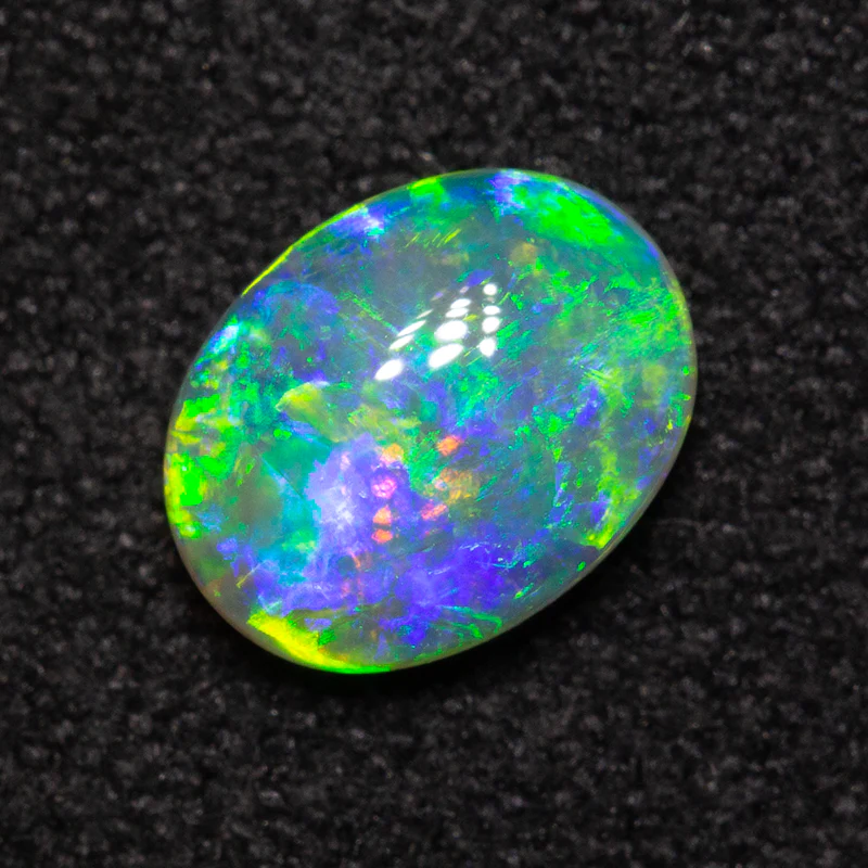 0.75 ct double-sided crystal opal 7.2x5.6x2.8mm - Image 3