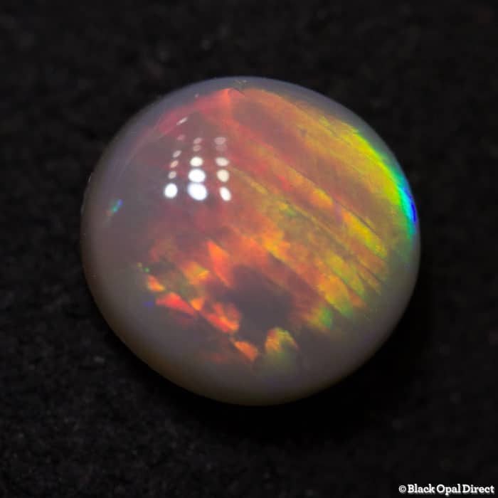 0.75 ct semi black opal 6mm round x3mm - Image 2