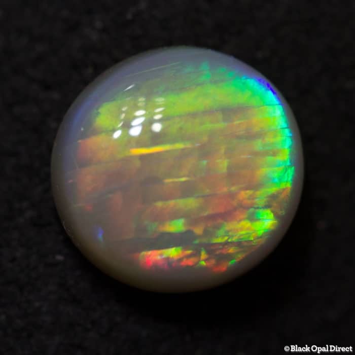 0.75 ct semi black opal 6mm round x3mm - Image 3