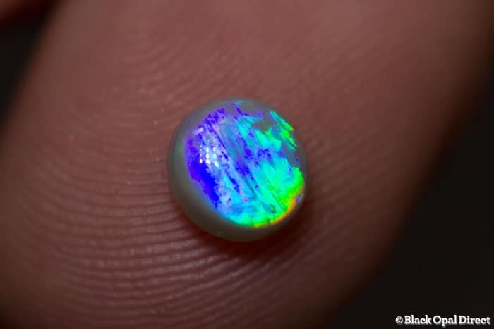 0.75 ct semi black opal 6mm round x3mm - Image 4