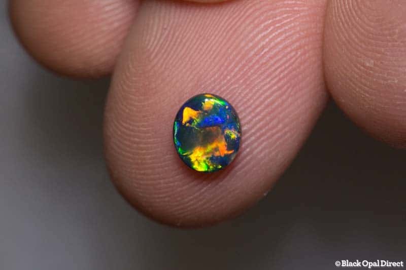 0.75 ct top gem black opal 7x6x2mm - Image 3