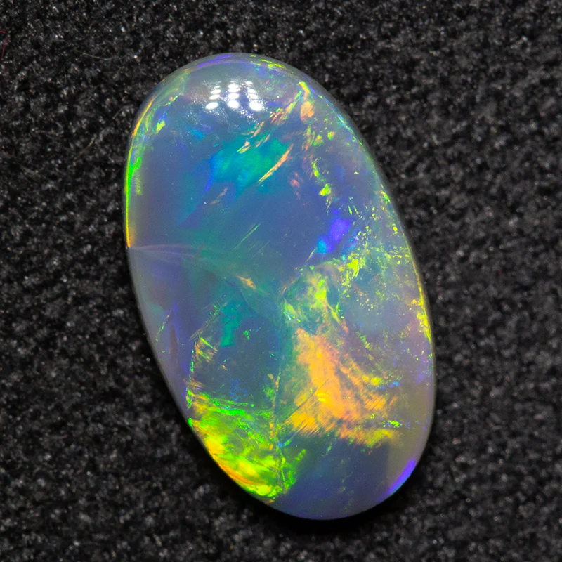 0.76 ct black opal 9.2x5.4x2.3mm - Image 3