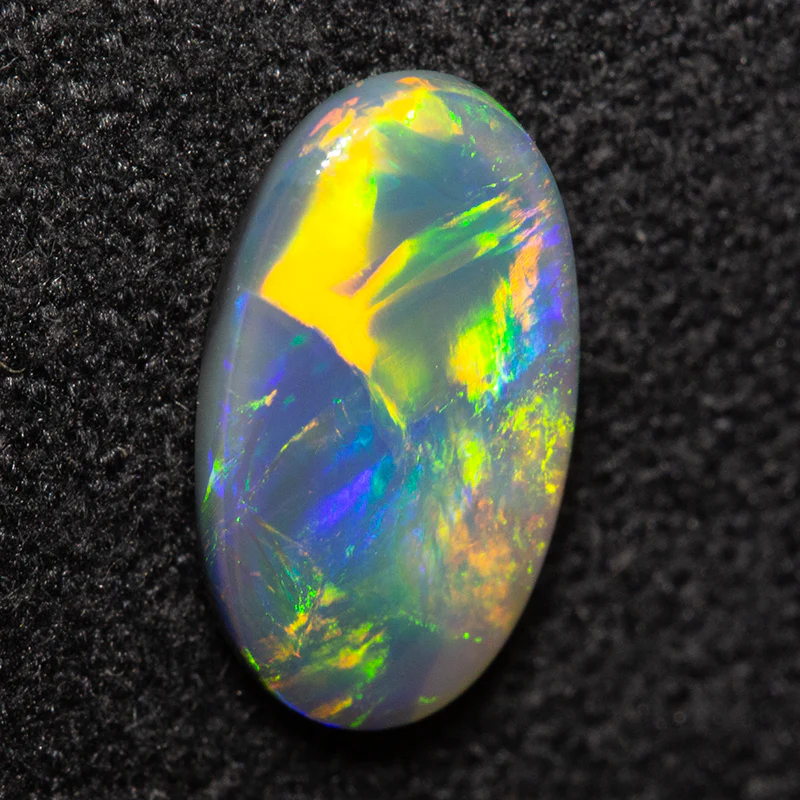 0.76 ct black opal 9.2x5.4x2.3mm - Image 4