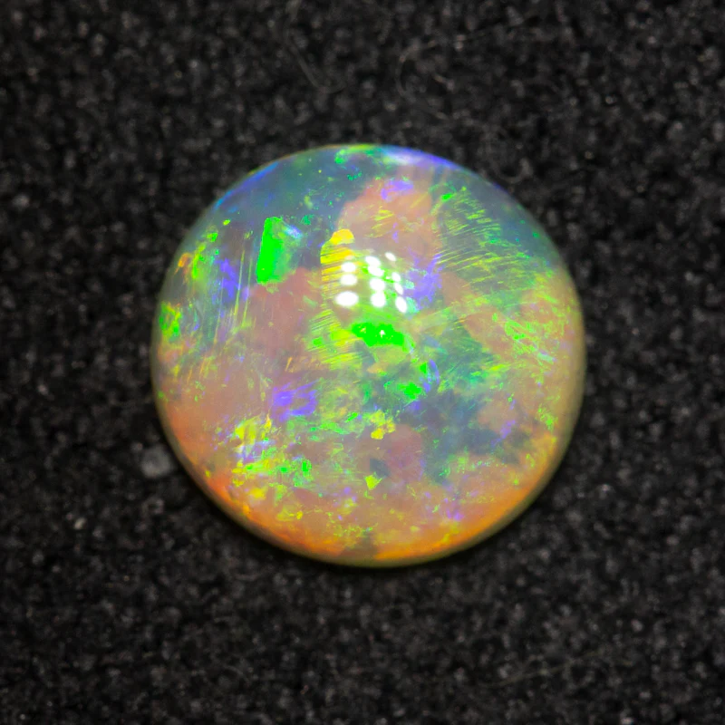0.76 ct crystal opal 6.9x6.6x2.7mm - Image 2