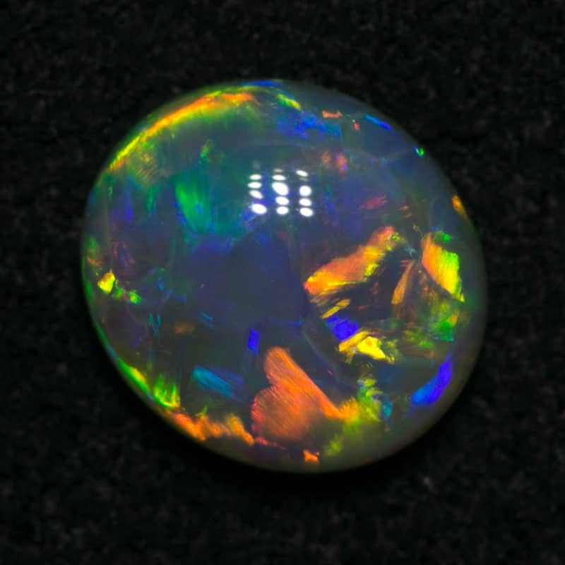 0.76 ct crystal opal 7x6x3mm - Image 2