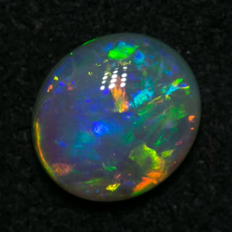 0.76 ct crystal opal 7x6x3mm - Image 3