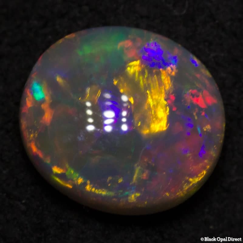 0.76 ct semi black opal 7x6x3.5mm - Image 3