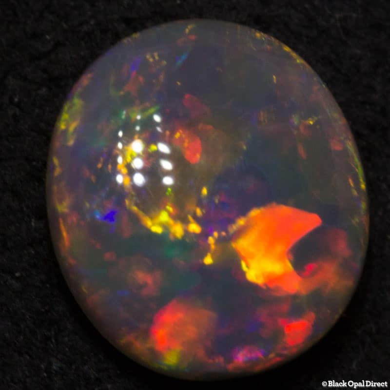 0.76 ct semi black opal 7x6x3.5mm - Image 4
