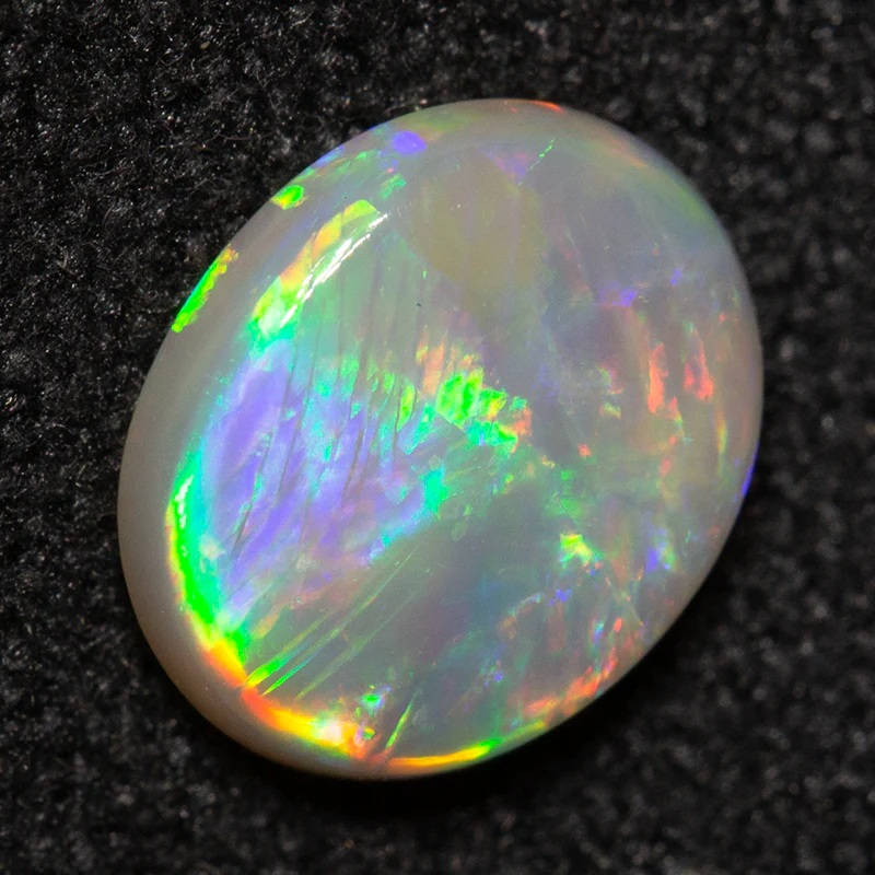 0.76 ct white opal 7.5x6.2x2.3mm - Image 2