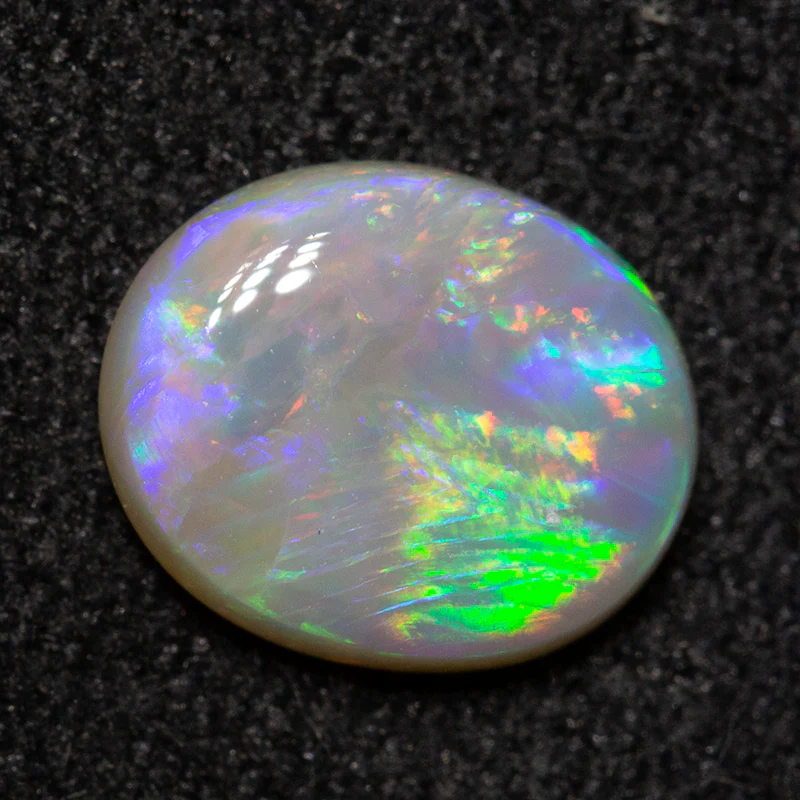 0.76 ct white opal 7.5x6.2x2.3mm - Image 3