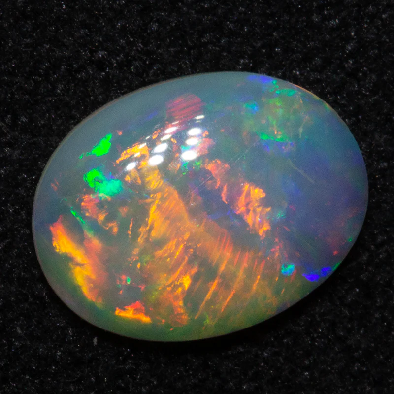 0.76 ct white opal 8.4x6.5x2.2mm - Image 2