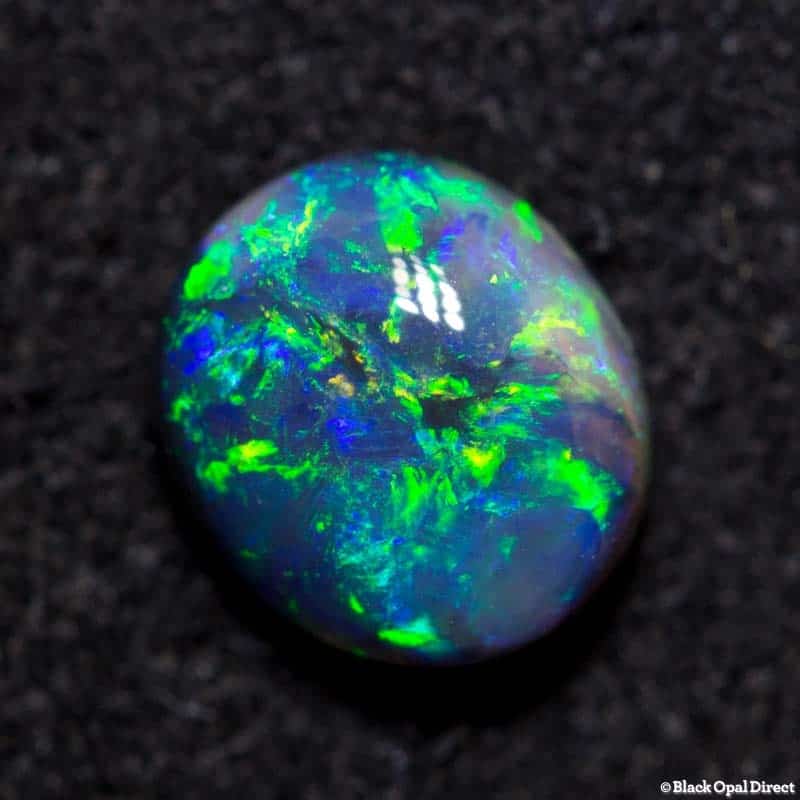 0.77 ct black opal 6x5x3mm - Image 2
