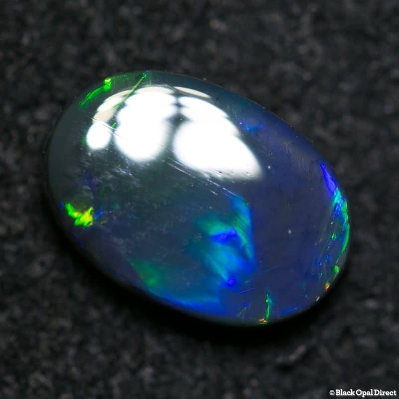 0.77 ct black opal 7.7x5x2.2mm - Image 2