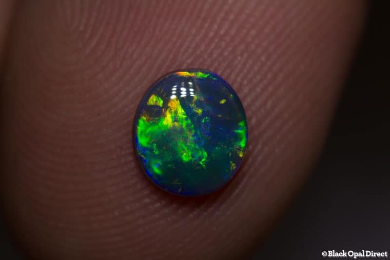 0.77 ct black opal gem 7x6.5x2mm - Image 3