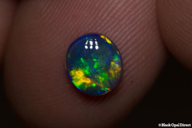0.77 ct black opal gem 7x6.5x2mm - Image 4
