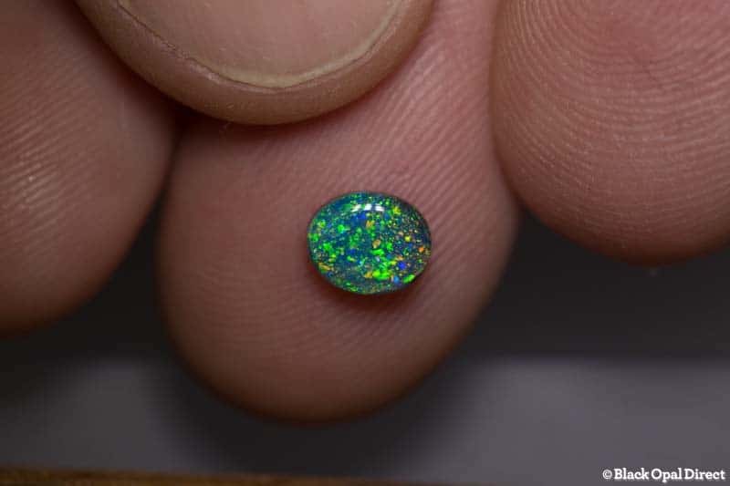 0.77 ct black opal pinfire pattern 6.4x5x3mm - Image 2