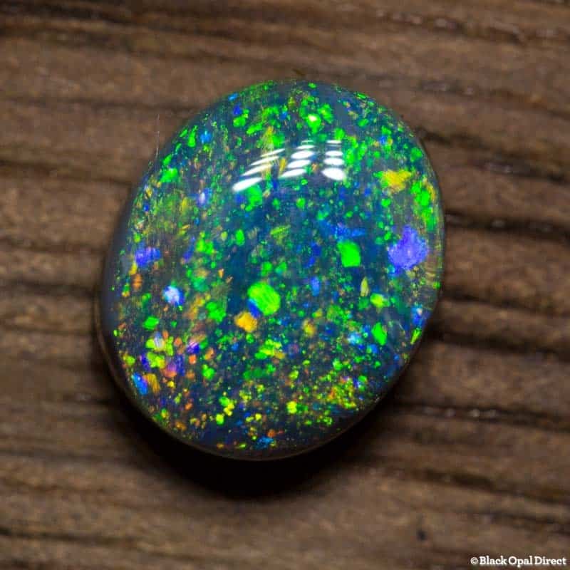 0.77 ct black opal pinfire pattern 6.4x5x3mm - Image 3