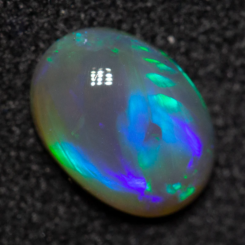 0.77 ct crystal opal 7.6x5.5x2.9mm - Image 2