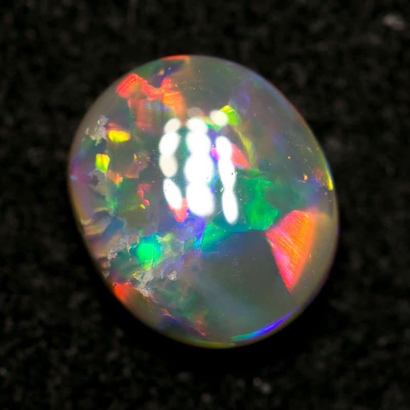 0.77 ct crystal opal 7x6x3mm - Image 2