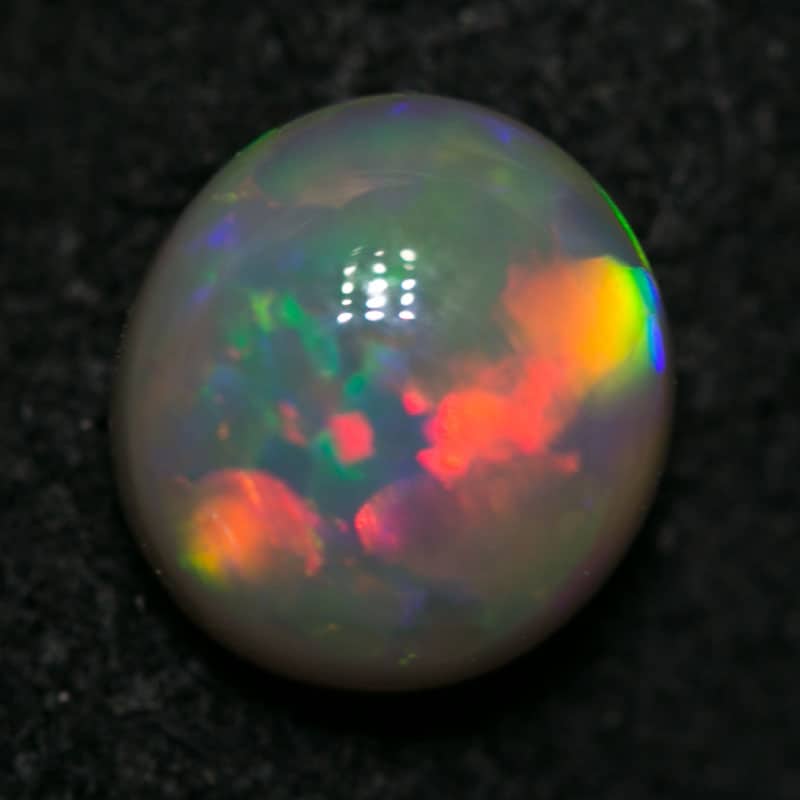 0.77 ct dark cats eye pattern 6x5.5x3mm - Image 2