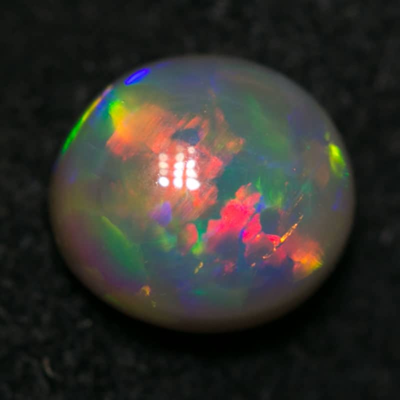 0.77 ct dark cats eye pattern 6x5.5x3mm - Image 4