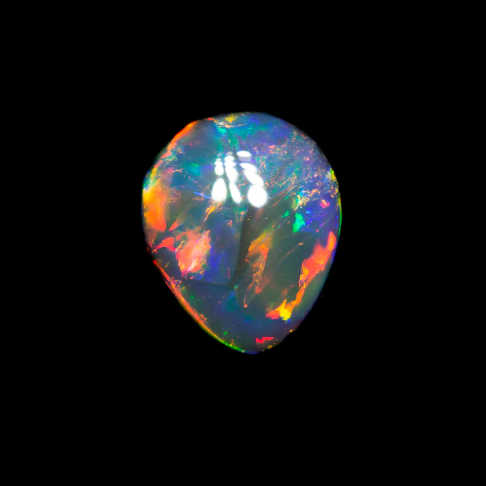 0.77 ct gem black opal 6.7x5.6x3.2mm - Image 4