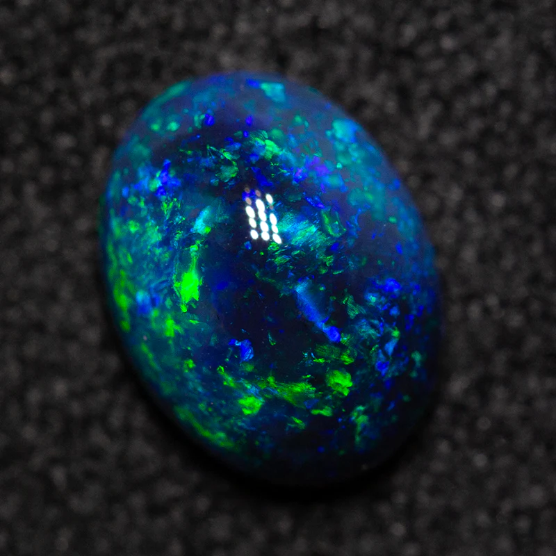0.78 ct black opal 7.1x5.3x3.4mm - Image 3