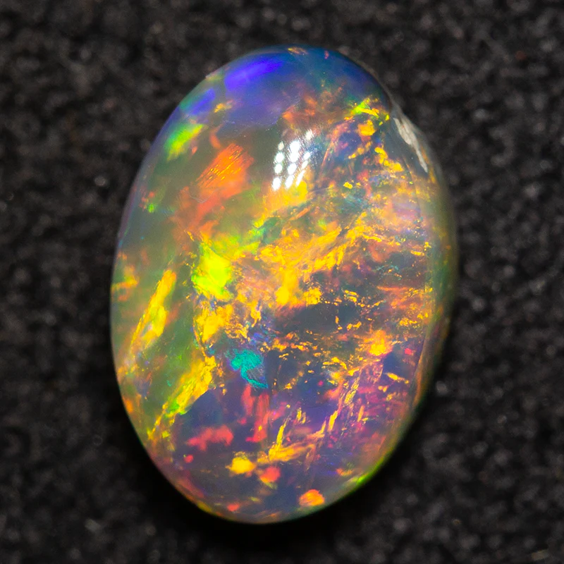 0.78 ct black opal 7.3x5.1x3.4mm - Image 2