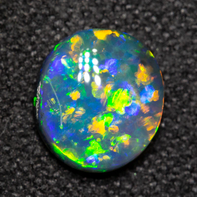 0.78 ct black opal 7x6.3x2.7mm - Image 2