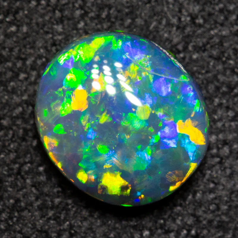 0.78 ct black opal 7x6.3x2.7mm - Image 3