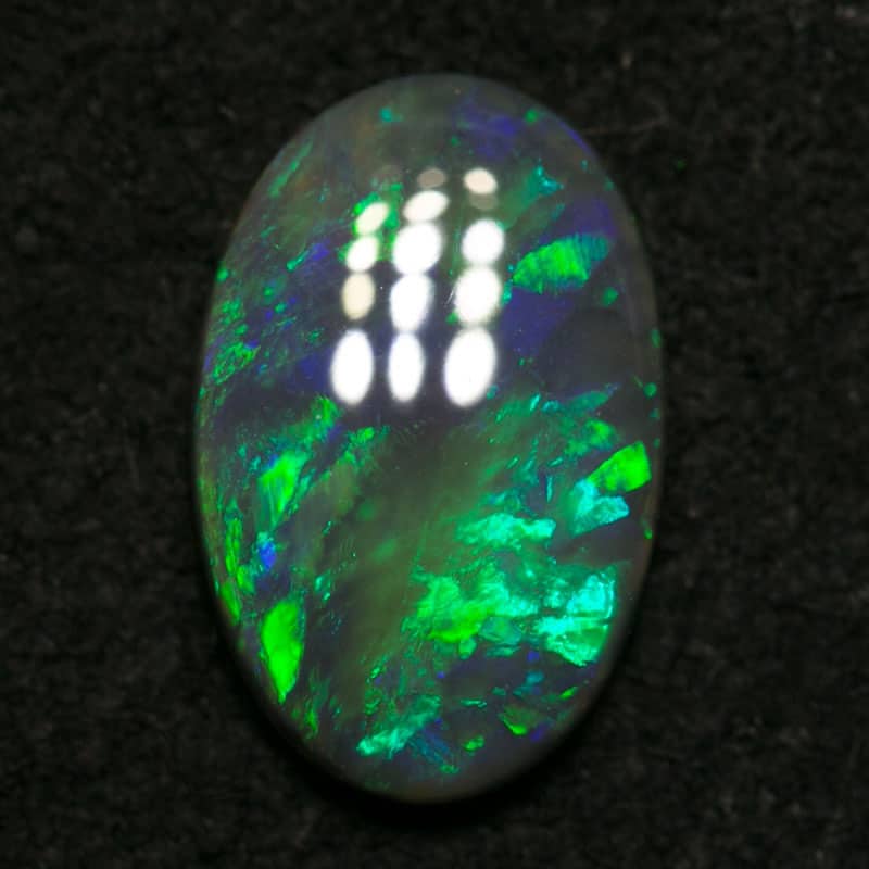 0.78 ct black opal 9x6x2mm - Image 2